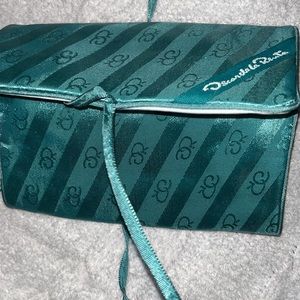 Oscar de la Renta inspired travel bag not sure if real universal tri fold.